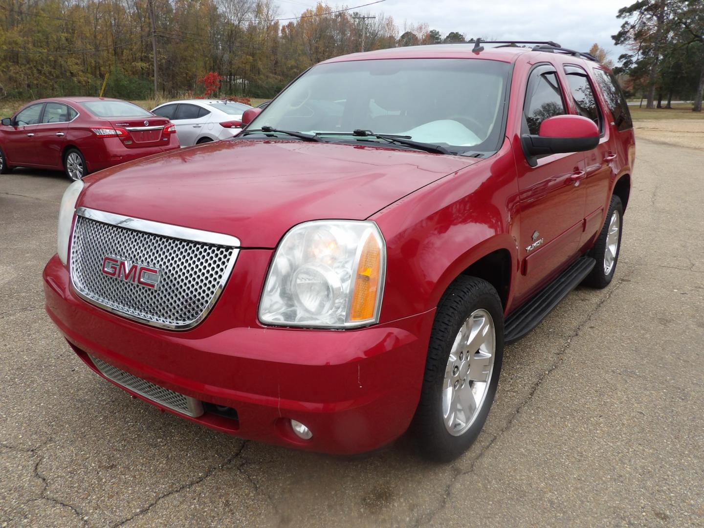 2012 Crystal Claret Tincoat /Tan GMC Yukon SLT (1GKS1CE00CR) with an 5.3L V8 engine, Automatic transmission, located at 401 First NE, Bearden, AR, 71720, (870) 687-3414, 33.726528, -92.611519 - Photo#0